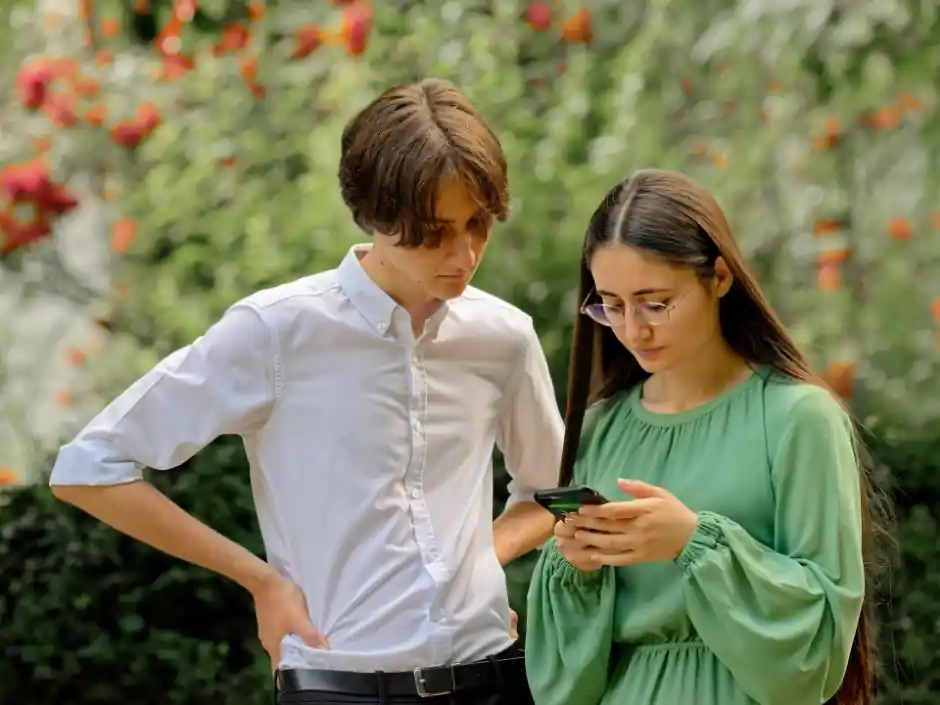 Young people looking at phone