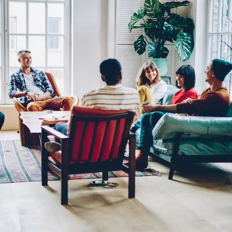 Young people meeting in office