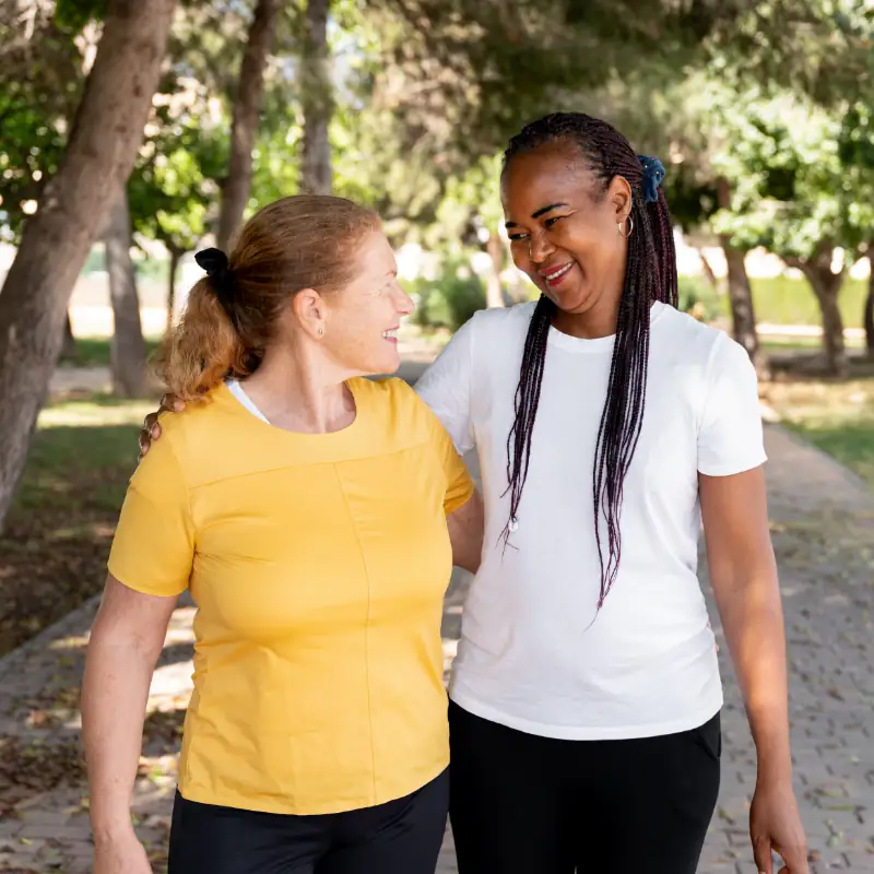 Two women talking with each other