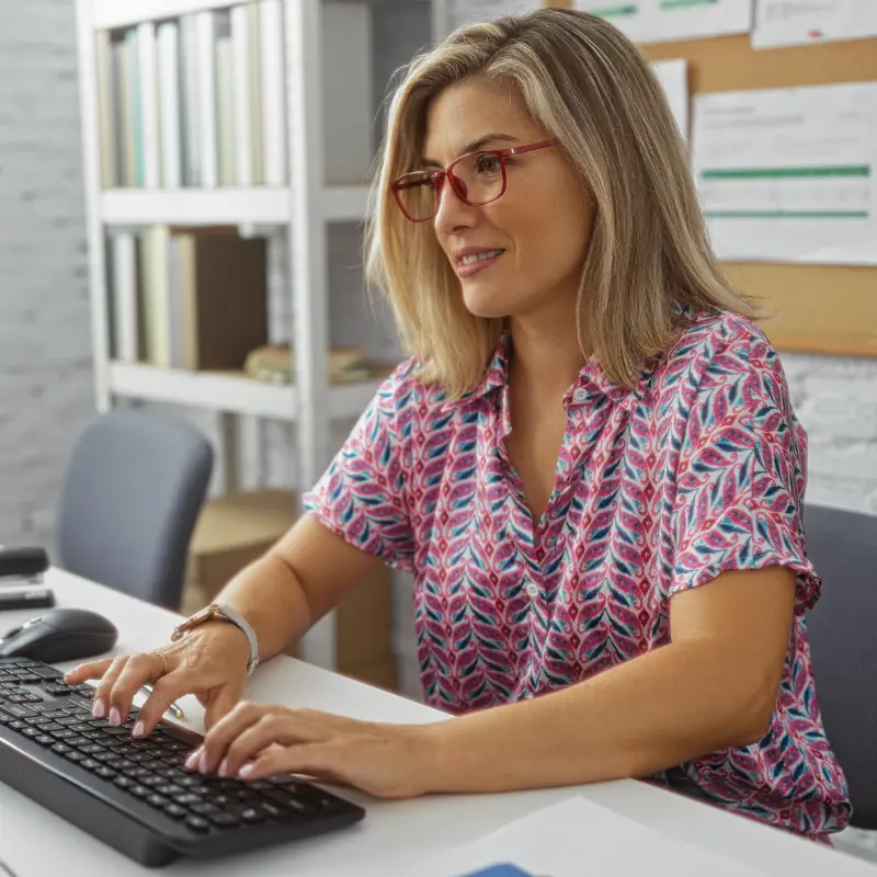 Woman typing in computer